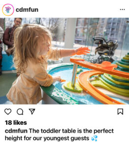 Instragram post from the Creative Discovery Museum showing a toddler playing at a splash table